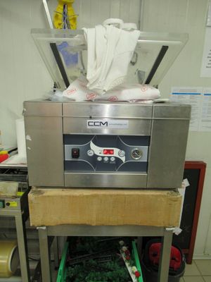 a machine that is sitting on a cart in a room