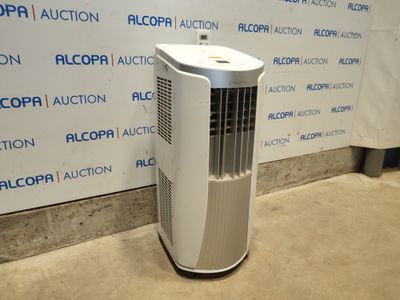un climatiseur blanc posé au sol devant un mur
