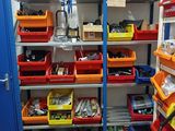 many bins of assorted items in the garage