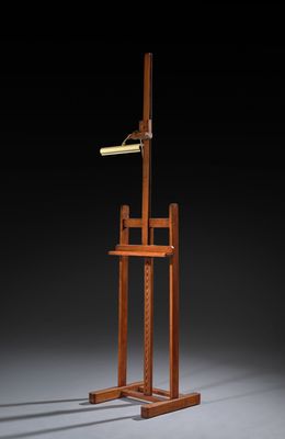 a wooden easer with a baseball bat on top of it