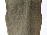 an image of a man ' s vest on a mannequin stand