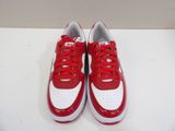 red and white nike air force sneakers on a white surface