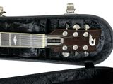 a guitar inside of a case on a white background