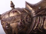 a statue of an elephant with a crown on it ' s head