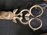 a close up of a pair of scissors on a table