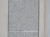 an open book with a black and white drawing on it