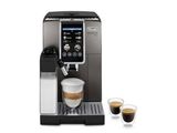 une machine à café avec une tasse de café à côté