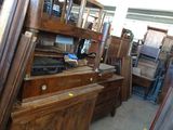 many pieces of furniture that are stacked together in a room