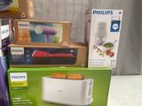 a box with a toaster and a toaster sitting on top of it