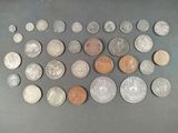 a lot of coins that are on the table