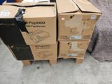 several boxes stacked on top of each other on a floor