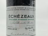 a bottle of wine that is sitting on a table