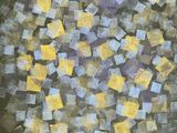 the cover of a book with yellow and blue squares on it