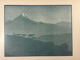 a picture of a picture of a mountain with a herd of cattle