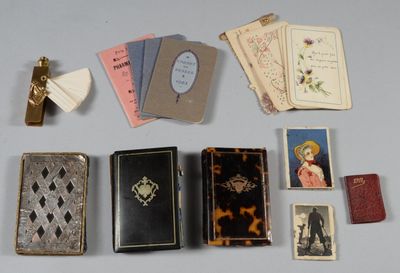 many different types of books and cards laid out on a table
