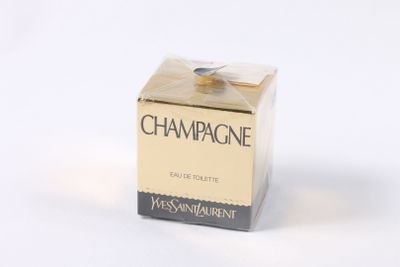 a box of champagne sitting on a white surface
