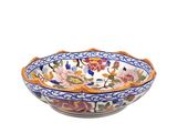 a close up of a bowl on a white background