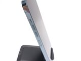 a close up of a cell phone on a stand