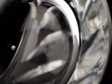 a close up of a glass vase with a black background