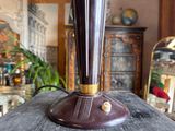 a lamp that is sitting on a table in a room