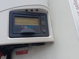 an image of a gas station with a digital display