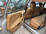 an image of a car with the door open