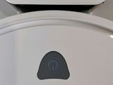 a close up of a toilet with the lid up