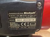 an image of a close up of the back of a red and black machine