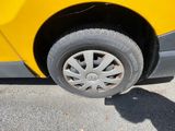 a close up of a car tire on the street