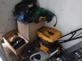 a box of tools and a box of tools in the corner of a room