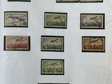 some of the stamps are on a piece of paper with writing on them