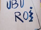 a sign that says ubu roo on the side of a building