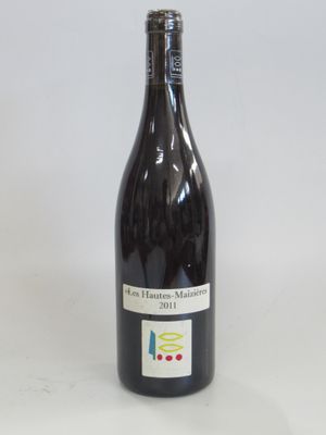 a bottle of wine that is sitting on a table