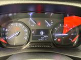 a close up of a car dashboard with a speedometer and gauges