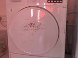 a washing machine and a dryer sitting on top of each other