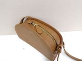tan leather cross body bag with gold zipper