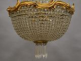 a chandelier hanging from the ceiling in the room