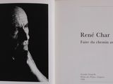 an open book with a picture of a man in a black and white photo