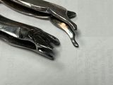 a pair of scissors that are on a table