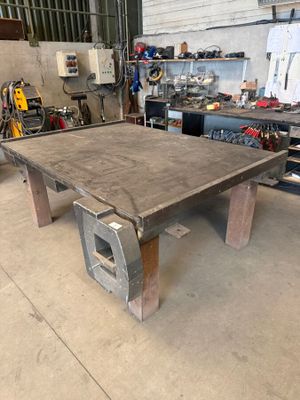a table that is made out of wood and metal