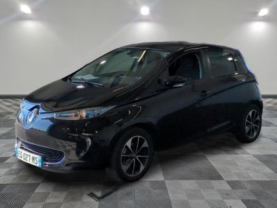 an image of a black car in a showroom