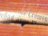 a close up of a piece of paper on a wooden table