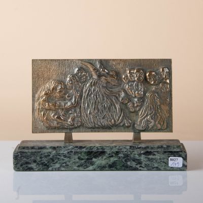 bronze sculpture of a group of monkeys sitting on a marble base