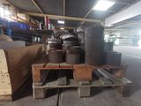 a pallet with a bunch of pots and pans on it