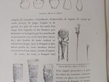 an open book with drawings of vases on it