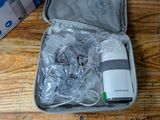 an open suitcase that is sitting on a wooden table