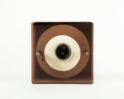 an image of a close up of a camera on a white surface