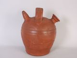 an image of a clay pot with three handles