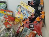 a lot of school supplies in a box on the table