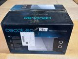 an image of a box of electronics sitting on top of a wooden table